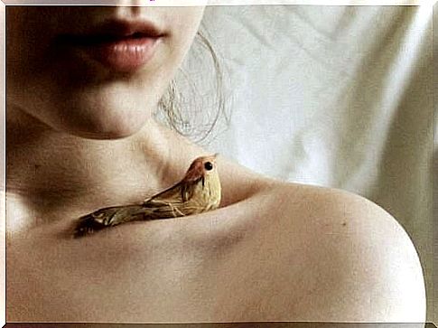 Girl With A Bird On Her Shoulder