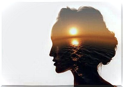 Woman with sunset in head