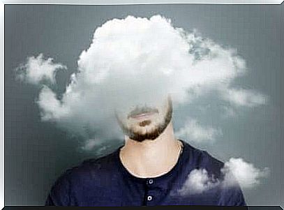 Man with head in the clouds
