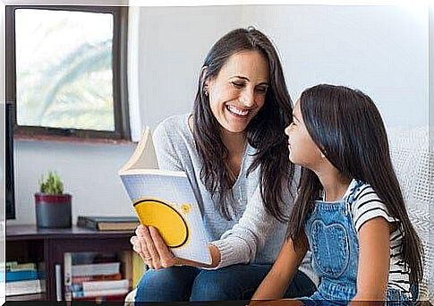 Mother teaches daughter to read