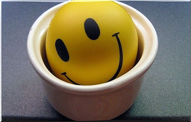 A smiling emoji in a jar
